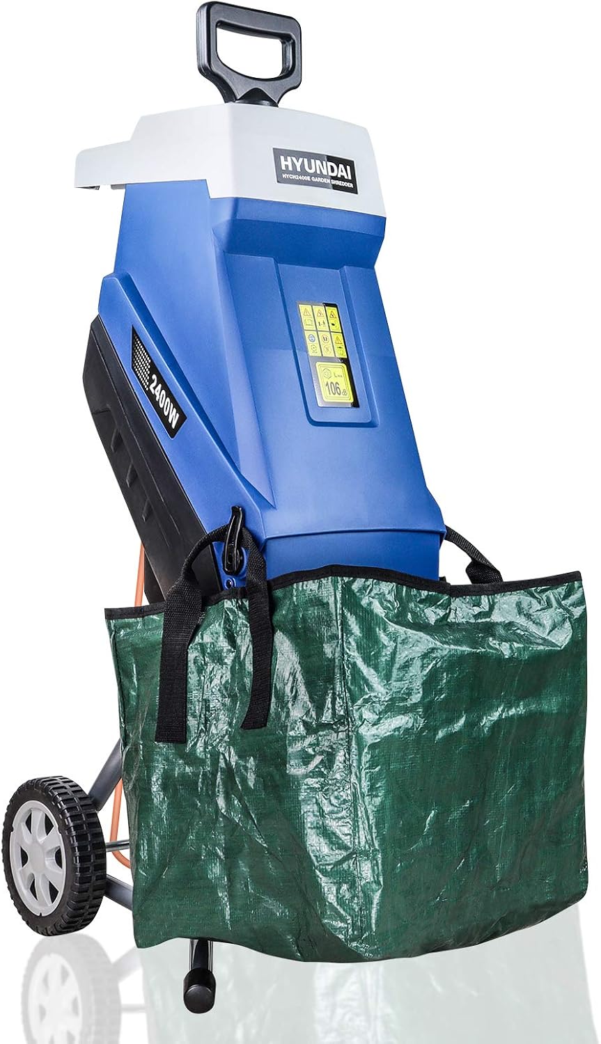 Hyundai HYCH2400E electric garden shredder on its wheeled frame with the green collection bag fitted and the orange power cable trailing