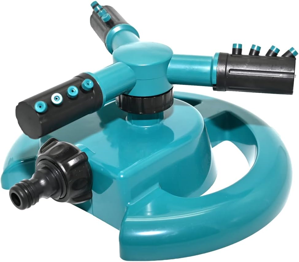 Ram 360 degree rotating garden sprinkler connected to a hose on a summer lawn