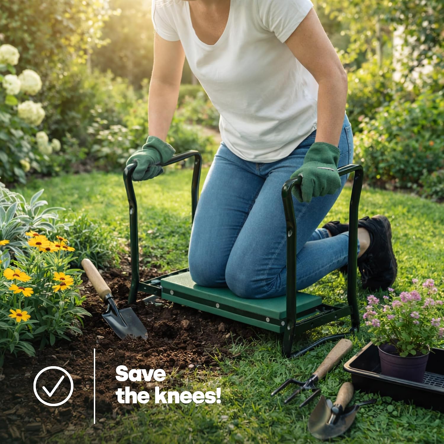 Gardener kneeling on the LIVIVO pad and gripping both side handles in a flower bed