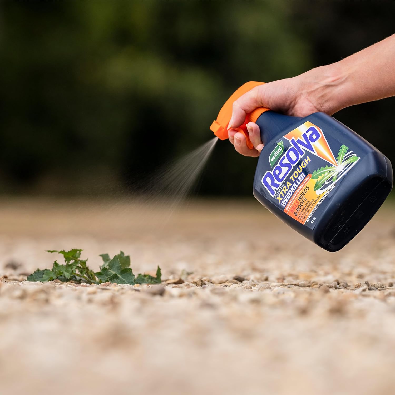 Resolva Pro weedkiller bottle photographed from an angle showing the trigger sprayer attachment