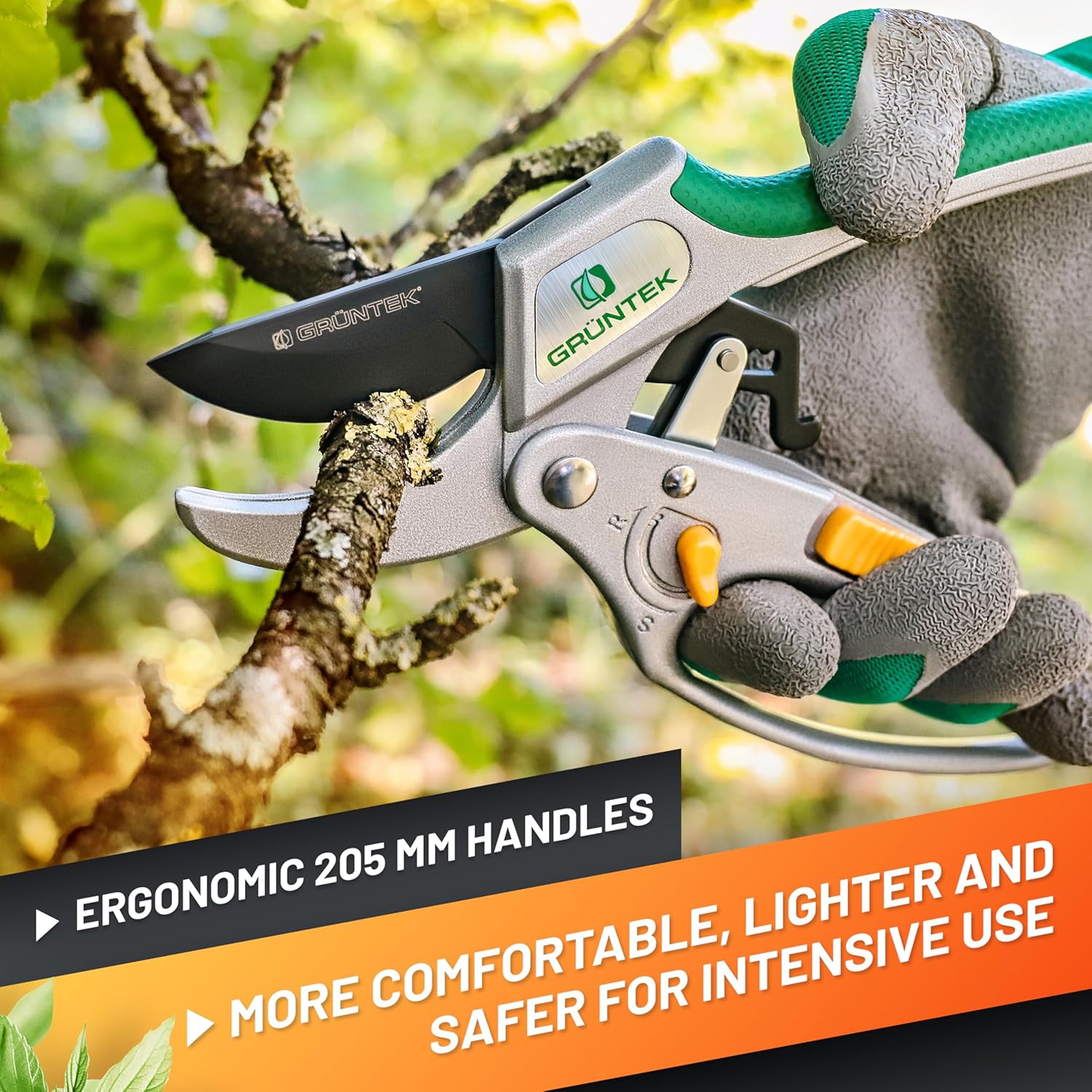Close-up of the ratchet secateurs locking slider mechanism on the handle