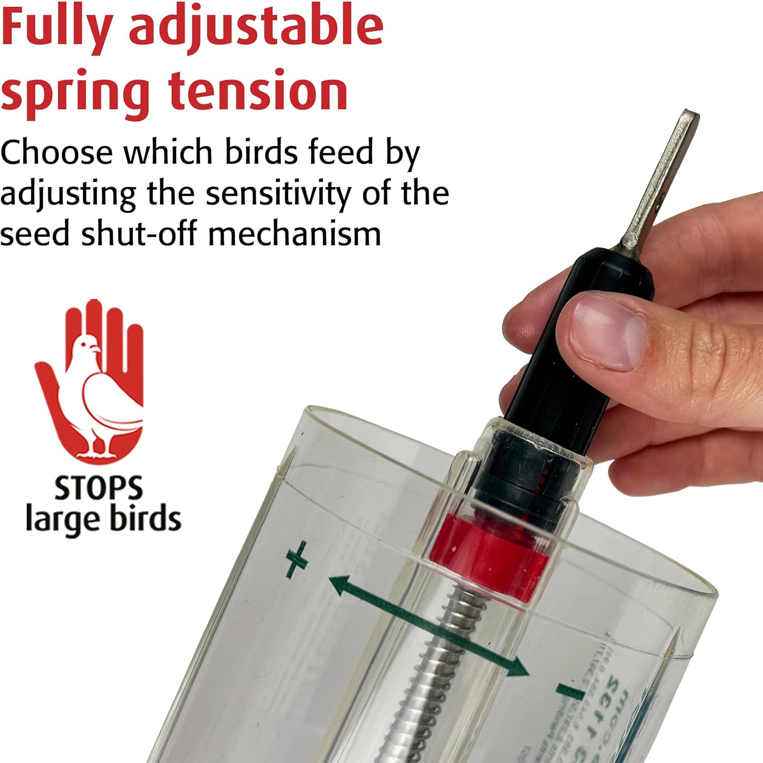 Screwdriver adjusting the red spring-tension collar inside the Squirrel Buster's clear seed tube