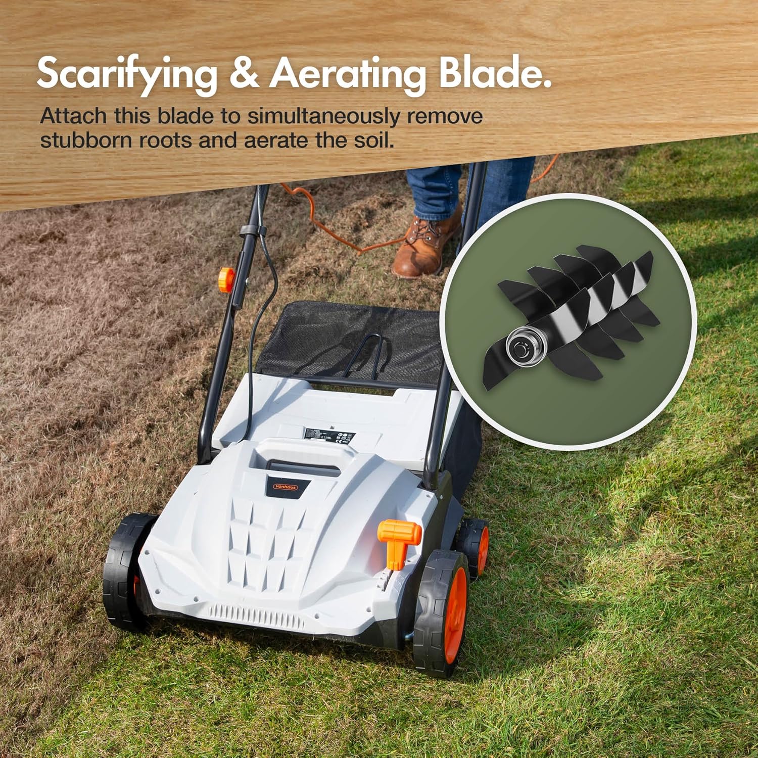 Close-up of the VonHaus scarifying and aerating blade drum on a partly scarified lawn