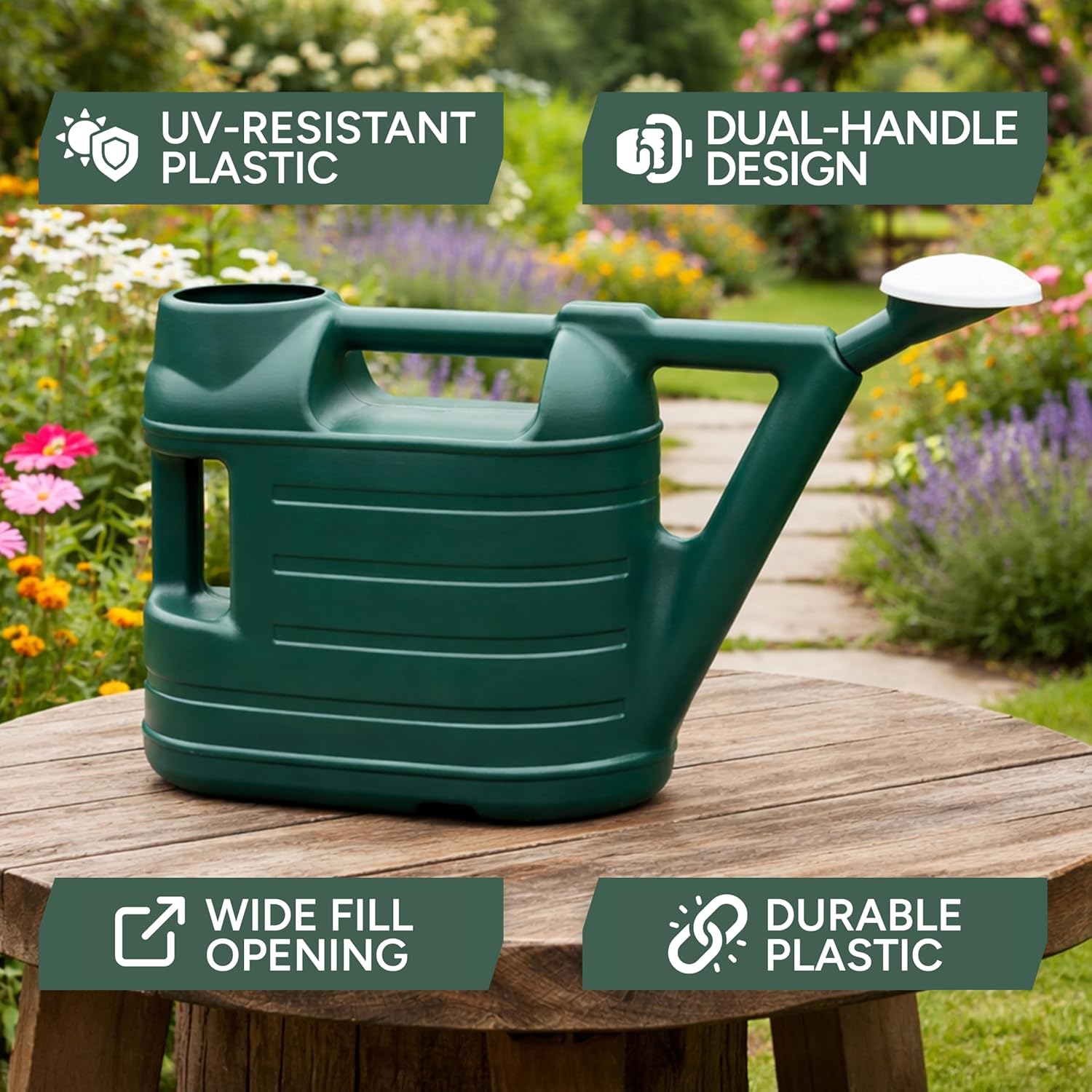 Green Zuvo watering can on a wooden garden table showing its dual handles and wide fill opening