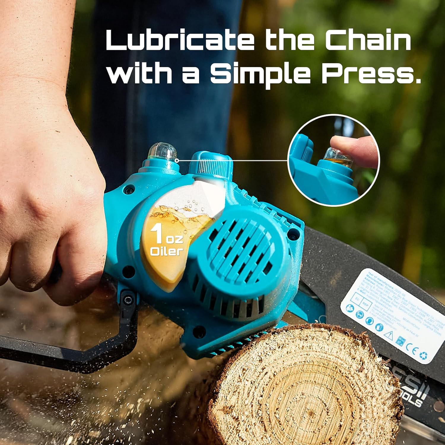 Thumb pressing the manual oiler button on the Seesii mini chainsaw, with the one-ounce oil reservoir visible in the blue housing